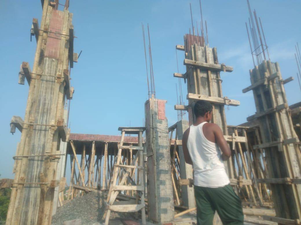 Tall column shuttering with reinforcement