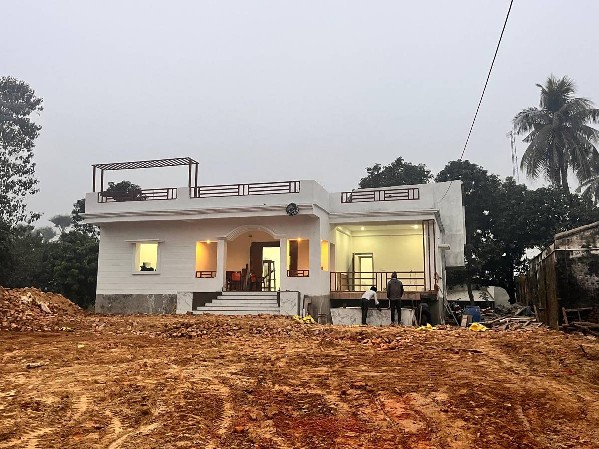 House lit at dusk