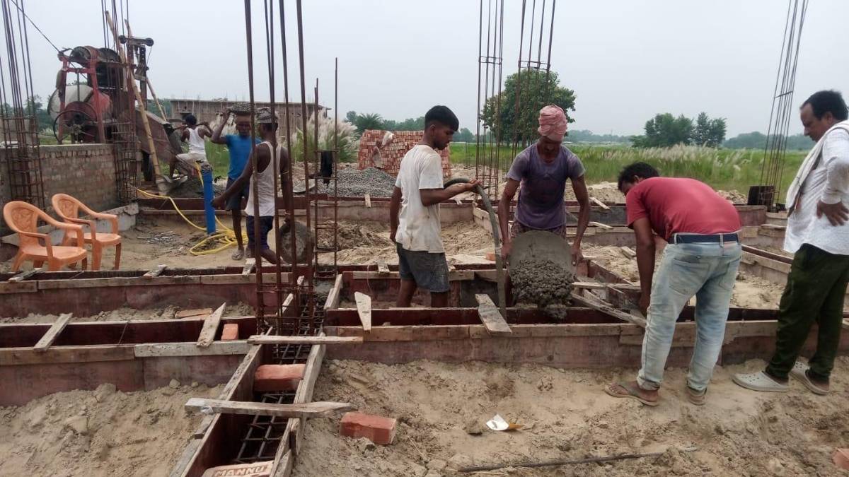 Concrete poured into foundation beams